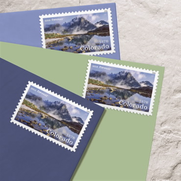 Three Colorado Statehood stamps shown on envelopes