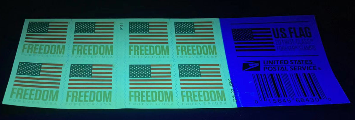 2023 U.S. Flag Freedom stamp pane under ultraviolet light