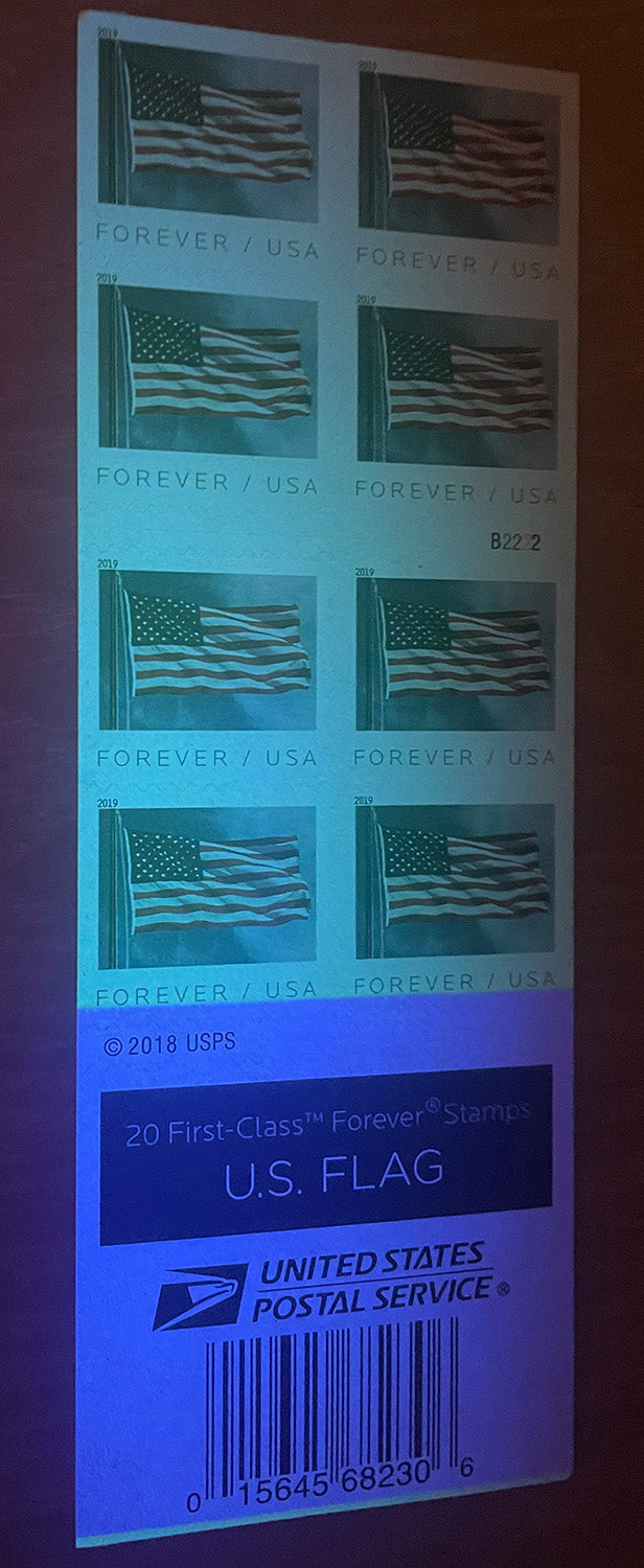 2019 U.S. Flag stamp sheet under ultraviolet authentication light