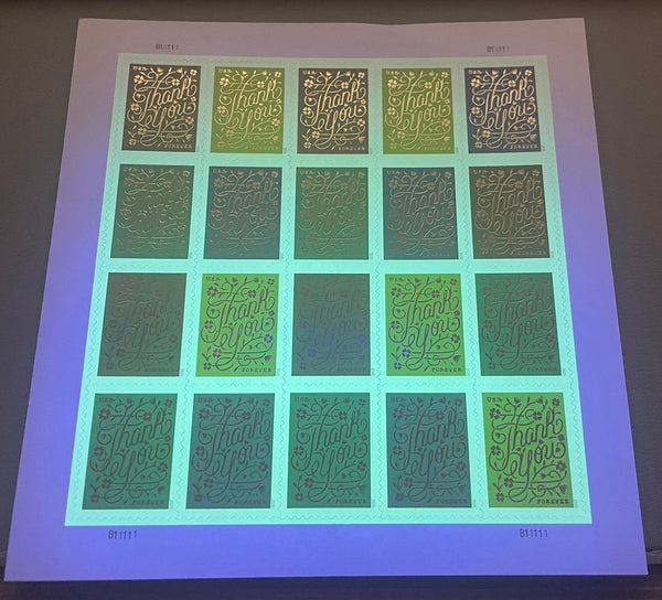 Thank You stamp sheet under ultraviolet authentication light
