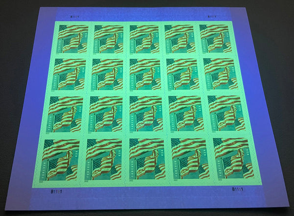 2022 U.S. Flag stamp booklet under ultraviolet authentication light
